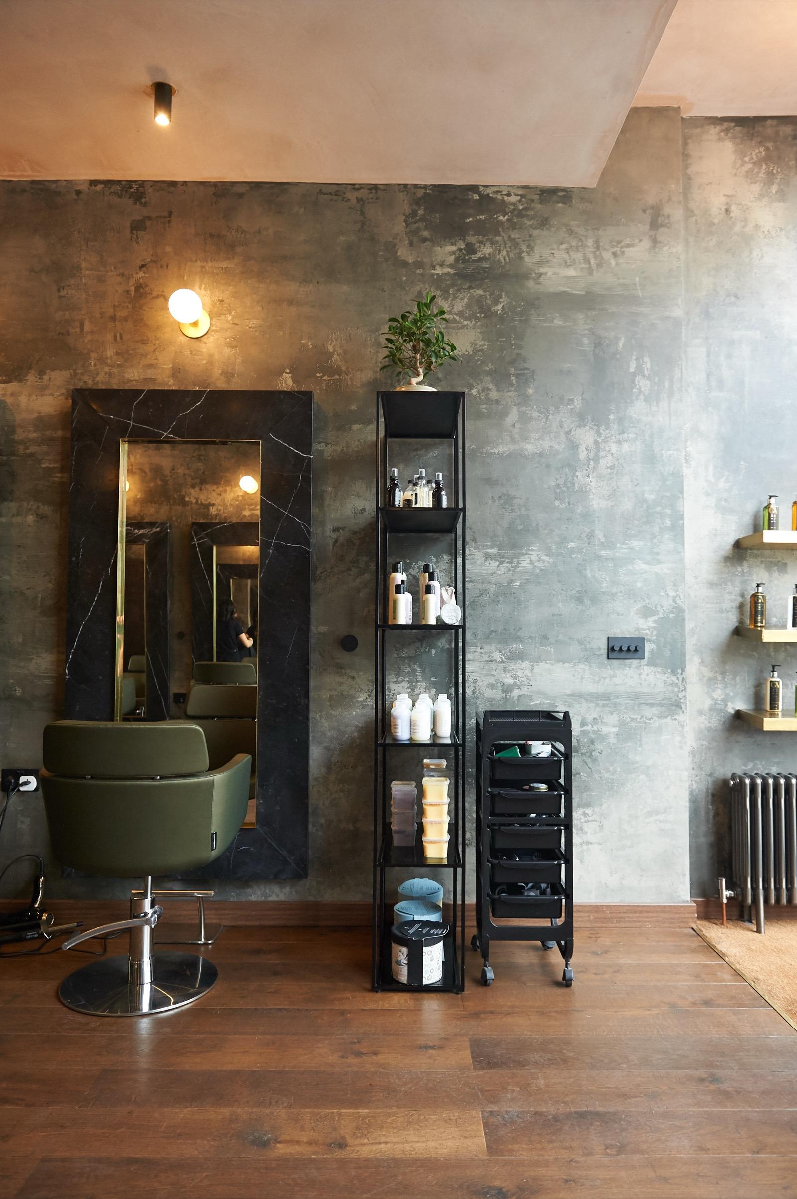 Individual precision cutting station at GA Wimbledon luxury salon